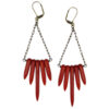 Red howlite bead earrings. Red howlite beads are suspended from a brass chain and ear wires.