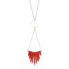 Red Howlite Bead Statement Necklace. Features red howlite beads hanging from a brass circle on a brass chain.