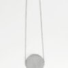 long silver necklace with silver medallion