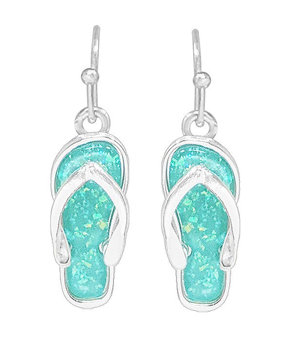 Small blue flip flop earrings made with metal and blue crystalized design.